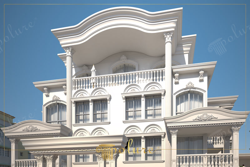 Klasik tarzda dekore edilmiş, beyaz poliüretan sütun ve kemerli söve süslemelerine sahip üç katlı villa dış cephesi.