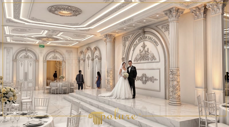 Poliüretan pilaster sütunlar ve kavisli duvar kemerleri ile dekore edilmiş beyaz klasik düğün salonu sahnesi.