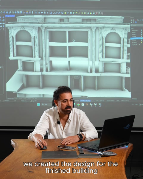 Ekranda binanın 3D katı modeli üzerinde tasarım detaylandırılıyor
