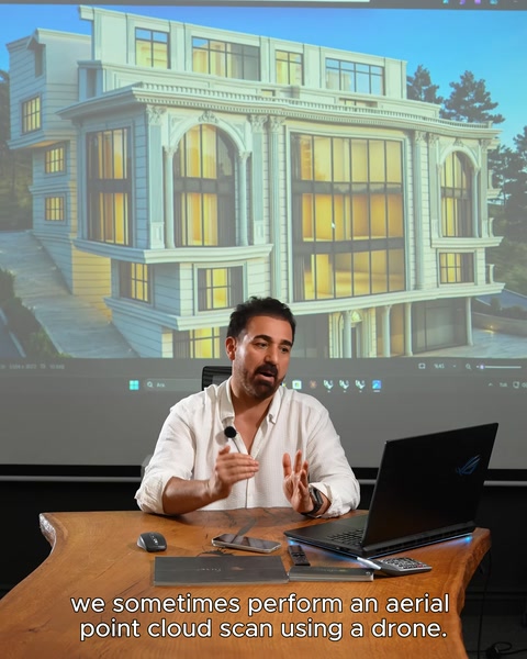Ekranda tamamlanmış binanın gece render görüntüsü sunuluyor
